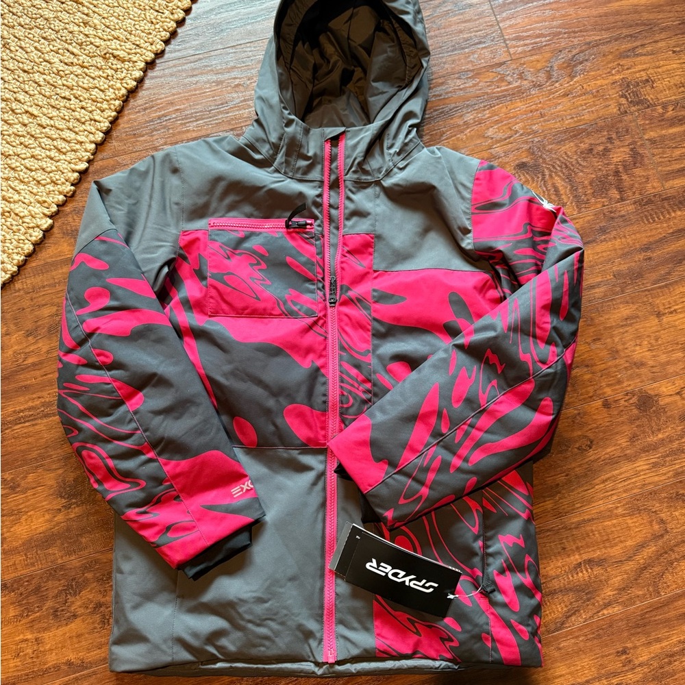 Spyder Boys Nederland Ski/Snowboard Hooded Jacket in Charcoal and Fuchsia.